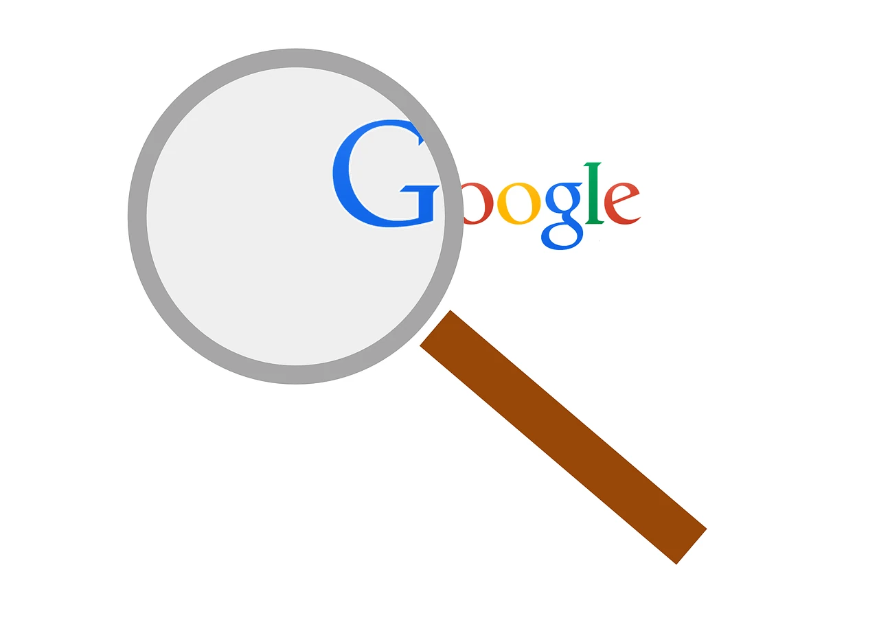 A magnifying glass held over the Google logo