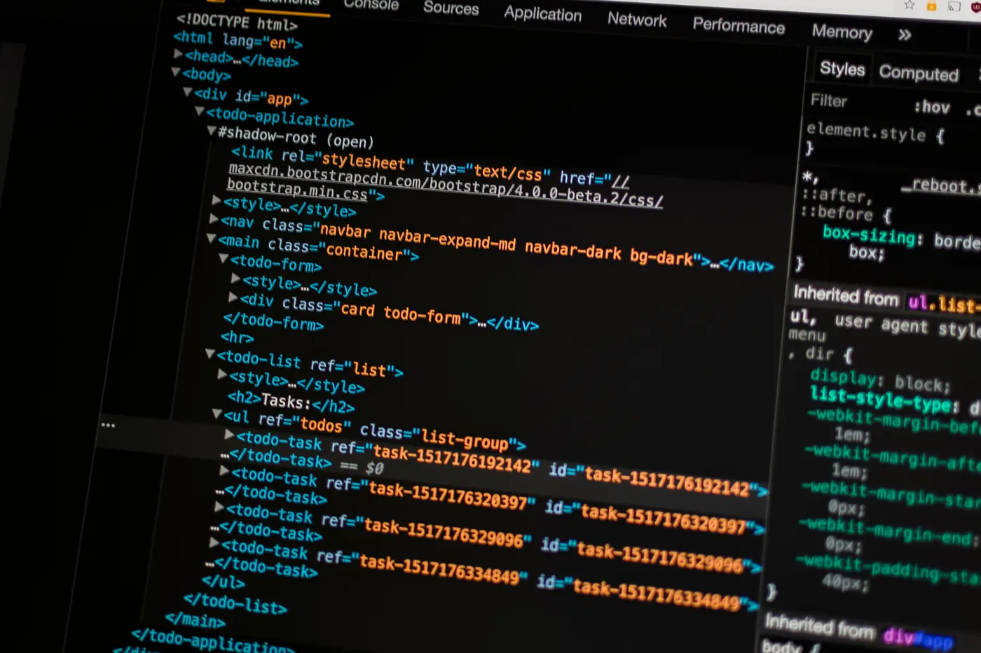 HTML source code on a screen with the browser inspector open beside it