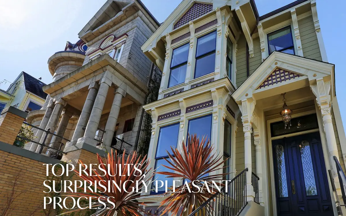 Ackerman Realty Group home page, below its menu: a photo looking up at an ornate painted wooden house with bay windows, a dark front door and a red spiky plant by the steps, and the headline Top results, surprisingly pleasant process in white