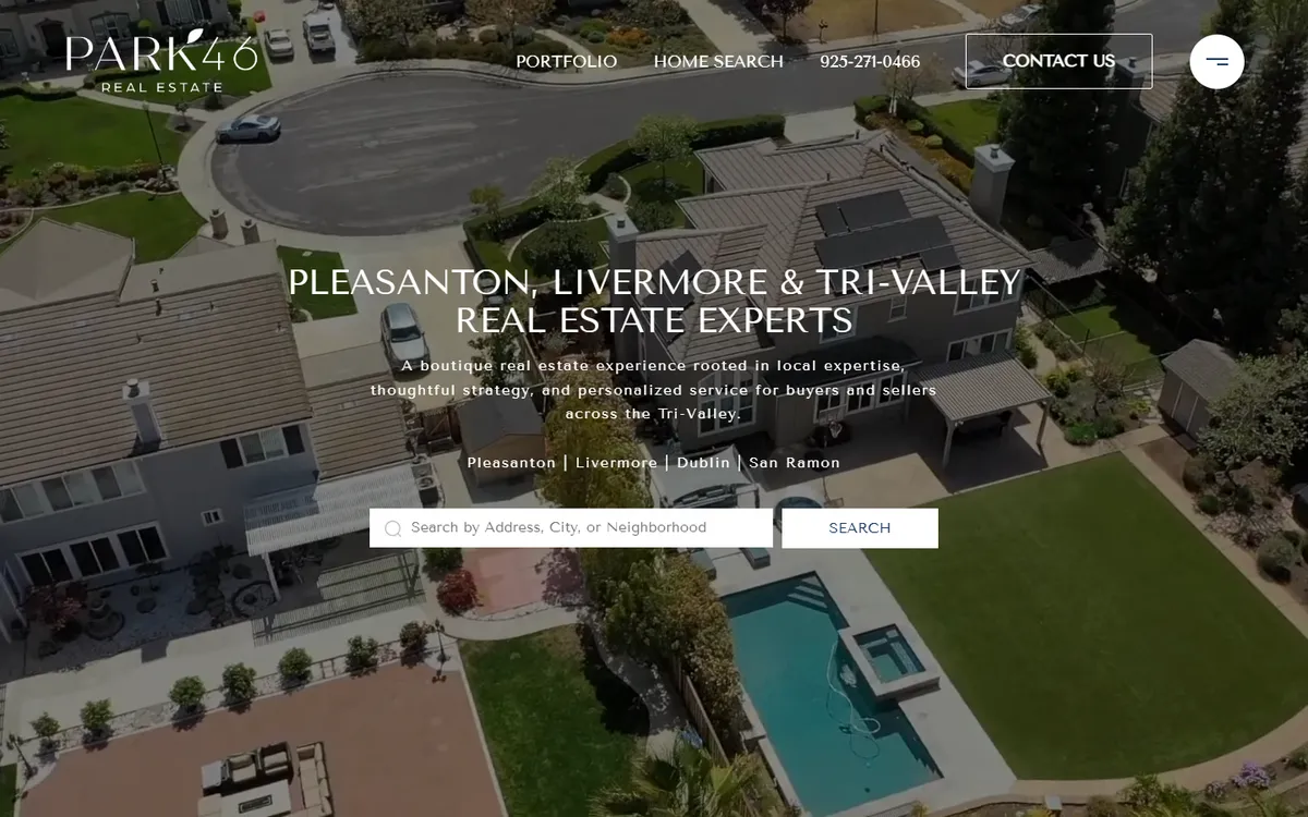 Park46 Real Estate’s home page at desktop width: an aerial photo of houses, the headline and a property search box