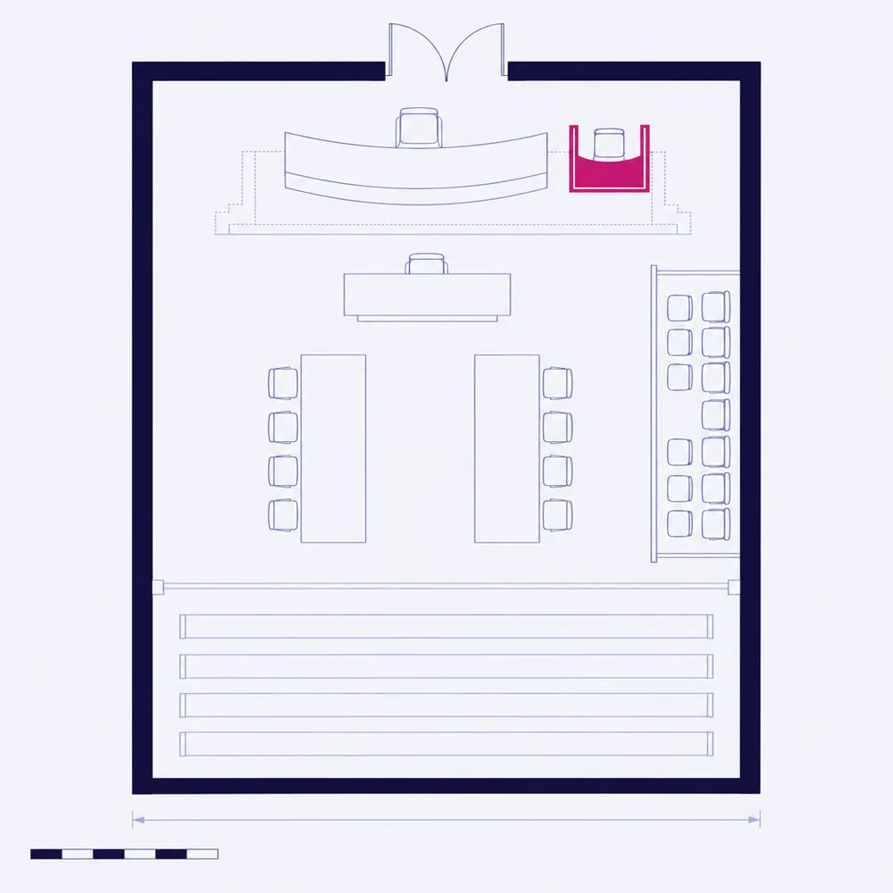 The plan of a courtroom: the bench and witness box on a dais, the clerk’s table, two counsel tables, the jury box and the public gallery