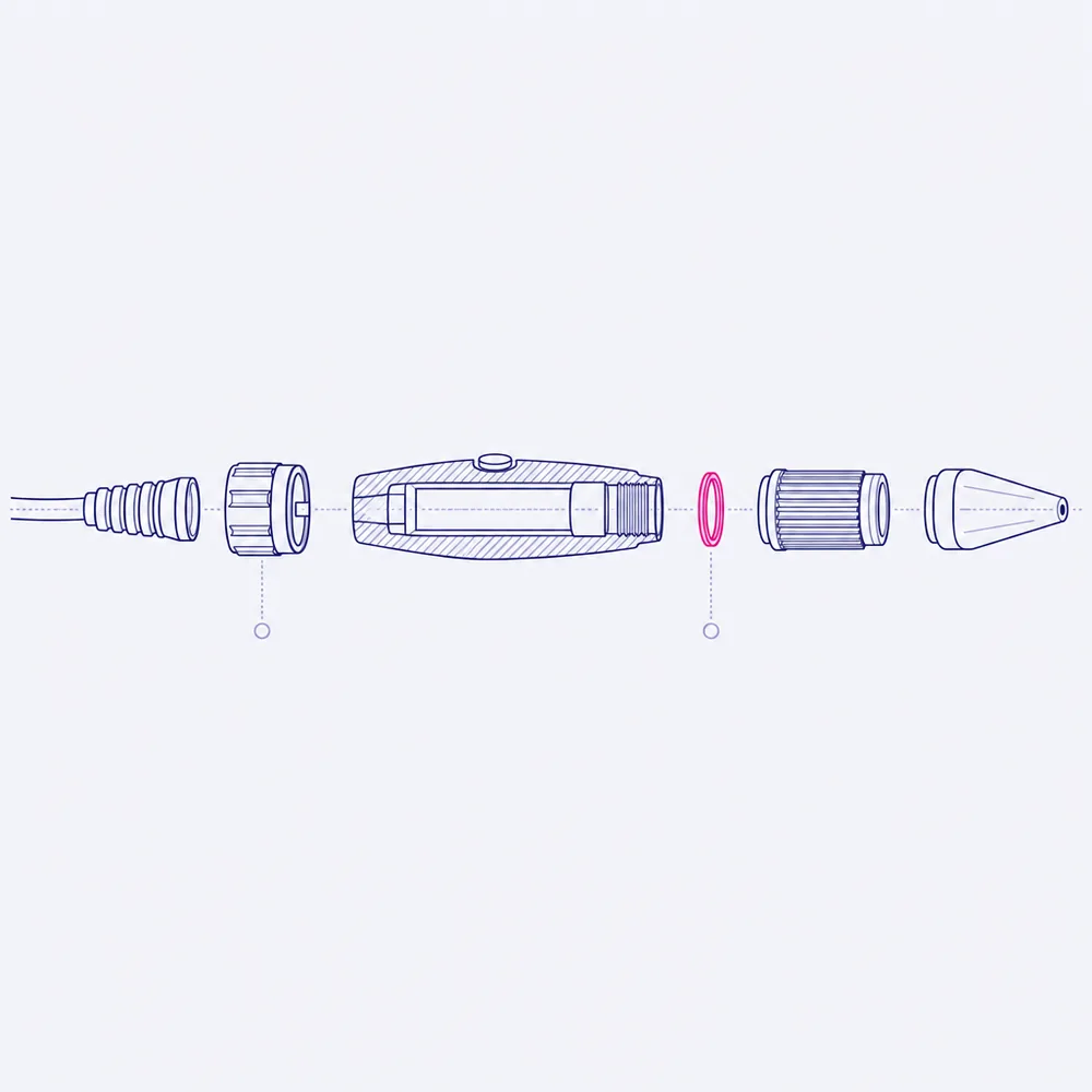 An exploded drawing of a treatment handpiece: cable and strain relief, connector collar, the body in section, a sealing ring, the cartridge and the tip